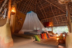 inside hut at dusk